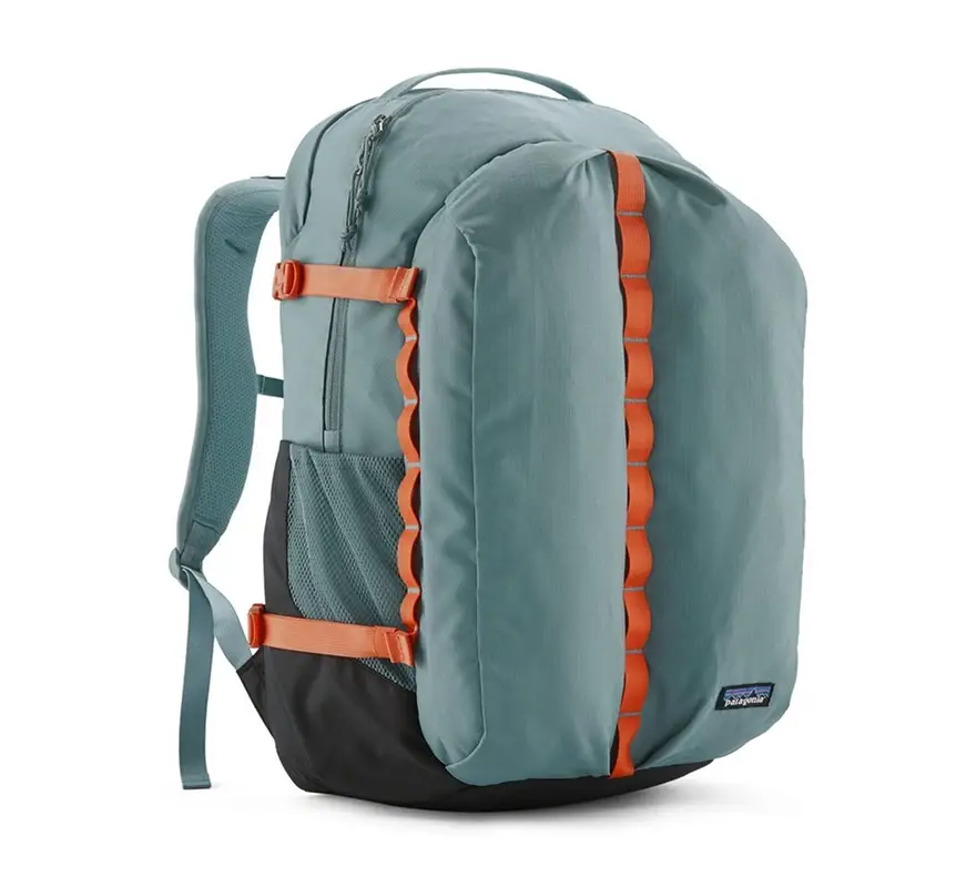 Patagonia backpack in teal with orange strap accents on white background
